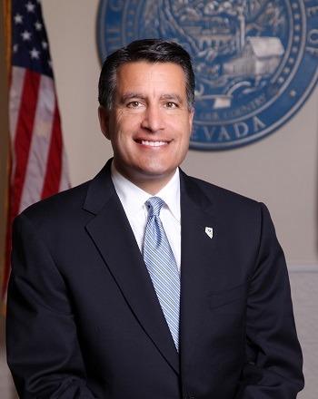 Governor Brian Sandoval praises Russell for his advocacy in autism
